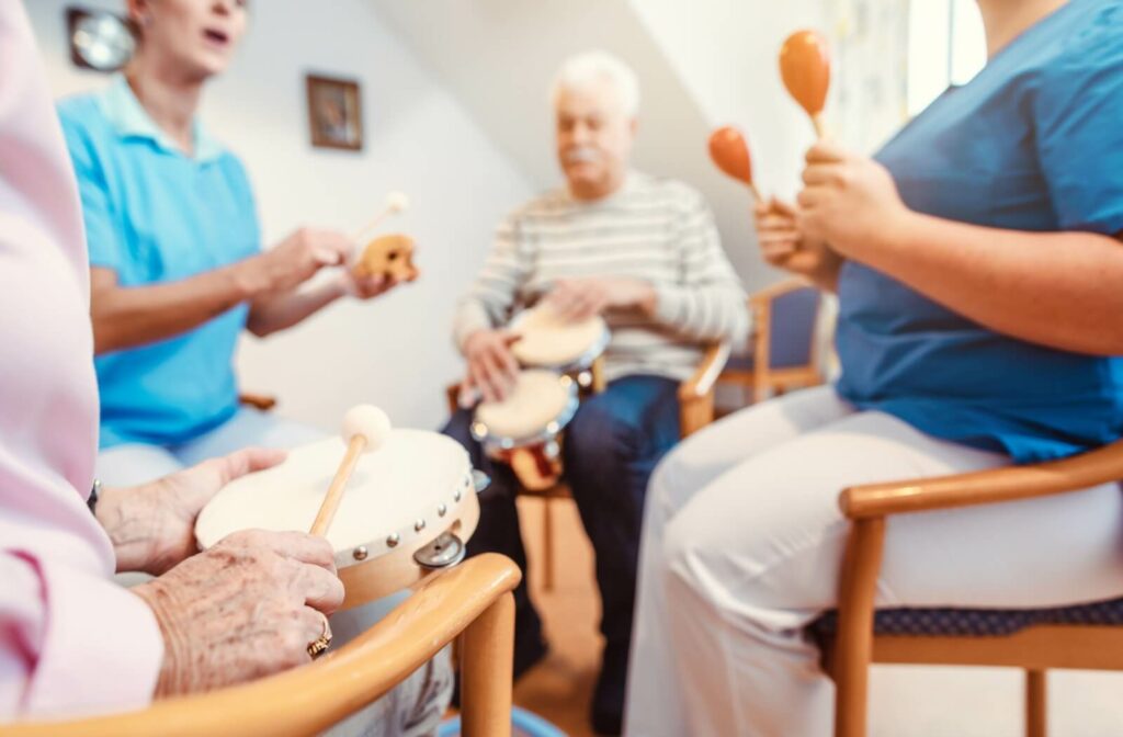 A group of older adults taking a music class together to support healthy aging.